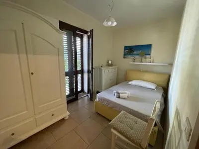 Letto o letti in una camera di Casa Carmen