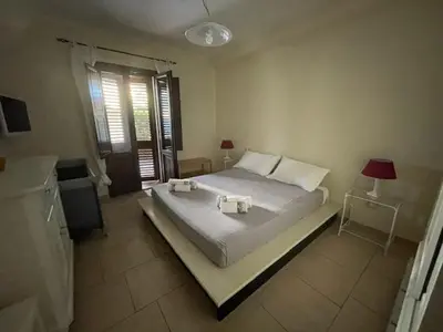 Letto o letti in una camera di Casa Carmen