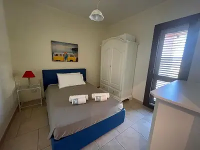 Letto o letti in una camera di Casa Carmen