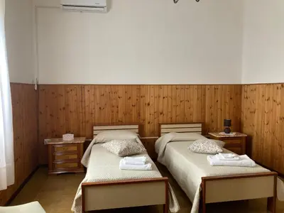 Letto o letti in una camera di Casa Vacanza Sulcis