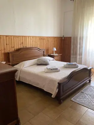 Letto o letti in una camera di Casa Vacanza Sulcis