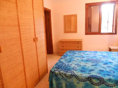 Letto o letti in una camera di Casa Elisa