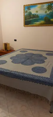 Letto o letti in una camera di Casa Elisa