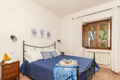 Letto o letti in una camera di Casa Tamà sul mare