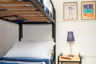 Letto o letti in una camera di Casa Tamà sul mare