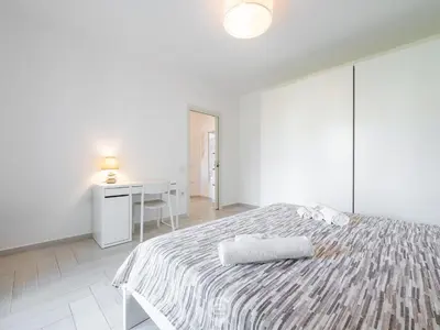 Letto o letti in una camera di Green Oasis Apartment