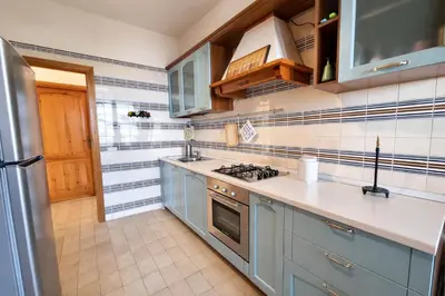 Cucina o angolo cottura di Villa Alex on the beach with sea view
