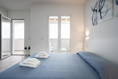 Letto o letti in una camera di Su Mari Rooms