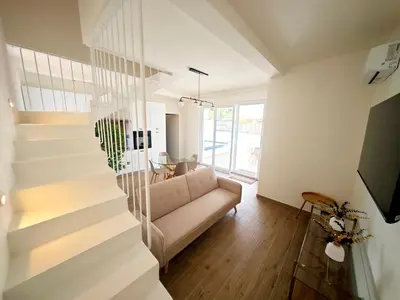 TV o dispositivi per l'intrattenimento presso Suite IKEBANA Porto Pino