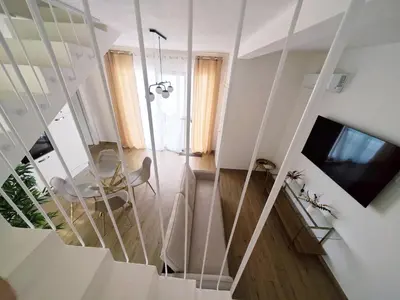 TV o dispositivi per l'intrattenimento presso Suite IKEBANA Porto Pino