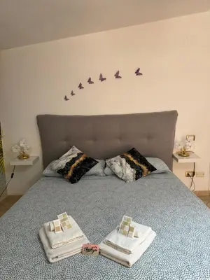 Letto o letti in una camera di Butterflyhouse2