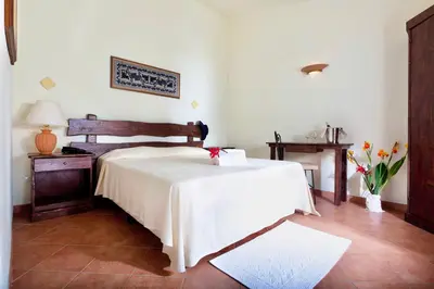 Letto o letti in una camera di Residence with swimming-pool in Arborea just 300 meters from the beach