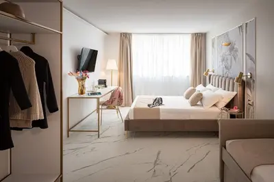 Letto o letti in una camera di Secréte Suites