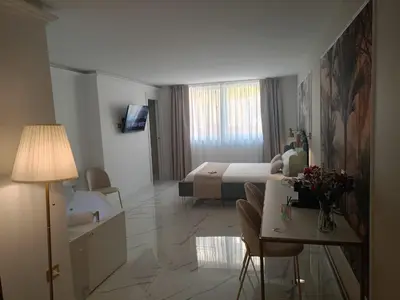 TV o dispositivi per l'intrattenimento presso Secréte Suites