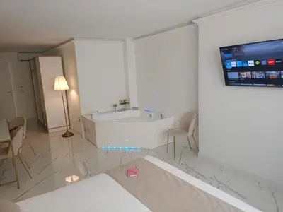TV o dispositivi per l'intrattenimento presso Secréte Suites