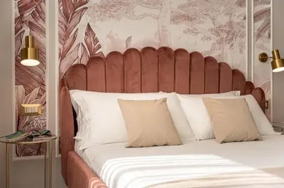 Letto o letti in una camera di Secréte Suites