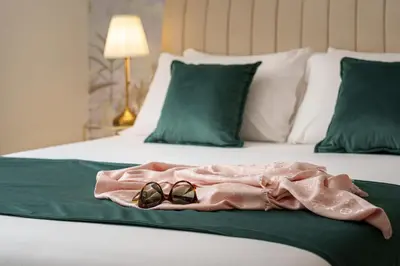 Letto o letti in una camera di Secréte Suites