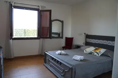 Letto o letti in una camera di La casa dei Girasoli