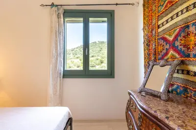 Letto o letti in una camera di Villa Maffi - spaziosa, vista mare e parcheggio