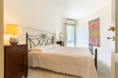 Letto o letti in una camera di Villa Maffi - spaziosa, vista mare e parcheggio