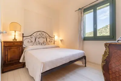 Letto o letti in una camera di Villa Maffi - spaziosa, vista mare e parcheggio