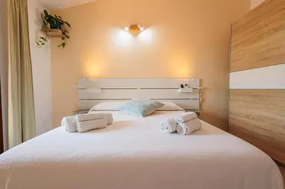 Letto o letti in una camera di Pothos Apartment, Relax in Sardegna