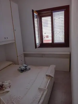 Letto o letti in una camera di Funtana Meiga - SINIS CABRAS