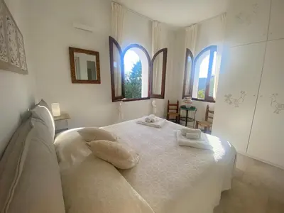 Letto o letti in una camera di Villa with private pool, amazing sea panorama and private garden