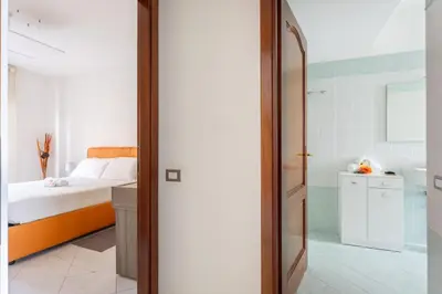 Letto o letti in una camera di [Tirso Home] Casa in centro Free parking & Wifi