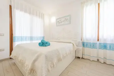 Letto o letti in una camera di Rey Palma House 400 m dal mare piscina esclusiva