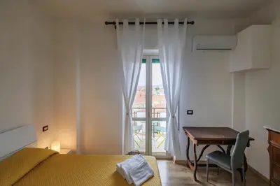 Letto o letti in una camera di La Fenice Suites Sardinia