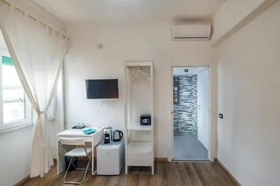 TV o dispositivi per l'intrattenimento presso La Fenice Suites Sardinia