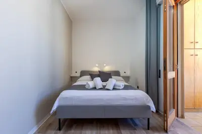 Letto o letti in una camera di MaxApartmentpoetto