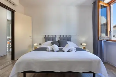 Letto o letti in una camera di MaxApartmentpoetto