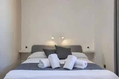 Letto o letti in una camera di MaxApartmentpoetto