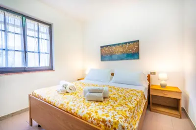 Letto o letti in una camera di Perla Marina, Estate Infinita, Is Mortorius