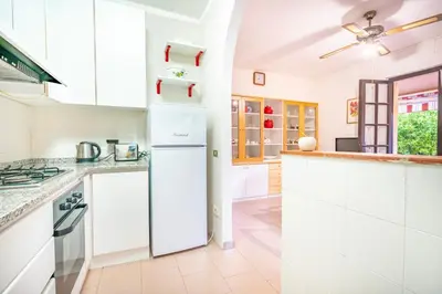 Cucina o angolo cottura di Perla Marina, Estate Infinita, Is Mortorius
