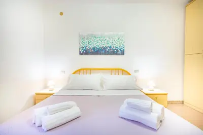 Letto o letti in una camera di Perla Marina, Estate Infinita, Is Mortorius