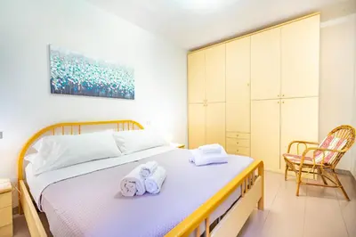Letto o letti in una camera di Perla Marina, Estate Infinita, Is Mortorius