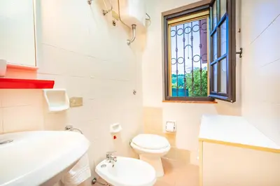 Bagno di Perla Marina, Estate Infinita, Is Mortorius