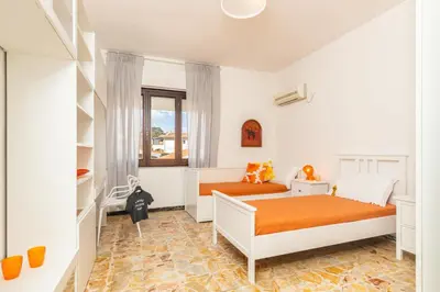 Letto o letti in una camera di Nonna ADELINA a 150 m da Cala Moresca