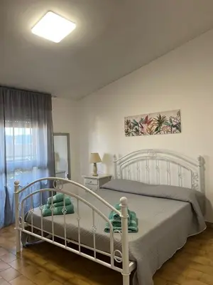 Letto o letti in una camera di Casa Vacanze Fior di Mondo