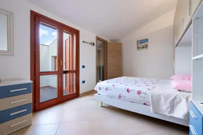 Letto o letti in una camera di Casa dei Giganti