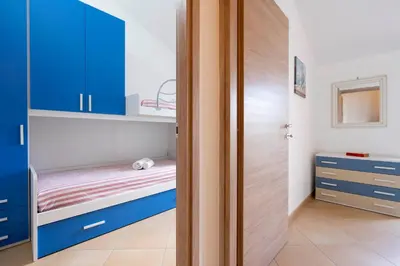 Letto o letti in una camera di Casa dei Giganti