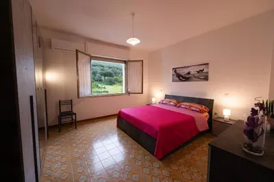 Letto o letti in una camera di Appartamento Casa Bruna ad Arbus