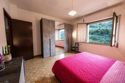 Letto o letti in una camera di Appartamento Casa Bruna ad Arbus