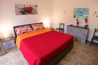 Letto o letti in una camera di Appartamento Casa Bruna ad Arbus