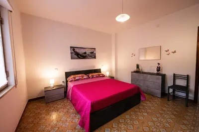 Letto o letti in una camera di Appartamento Casa Bruna ad Arbus