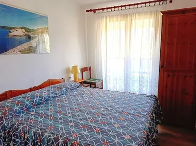 Letto o letti in una camera di Appartamento Luisa D