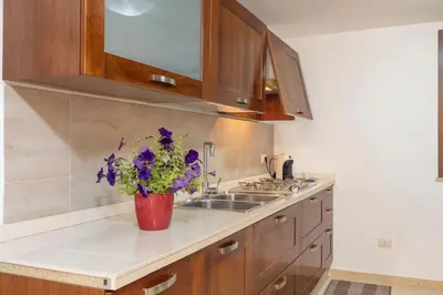 Cucina o angolo cottura di Cala Sinzias Jo Beach